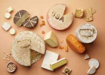 cheese, specialty cheese, photoshoot, US cheese, display, pairings, USA map, USA letters, branded, wedges, pairings, semi-soft, bloomy, mold, blue, Rogue River, Cabot, cheddar, bandaged, cloth bound, alpine, 2020 specialty cheese photoshoot